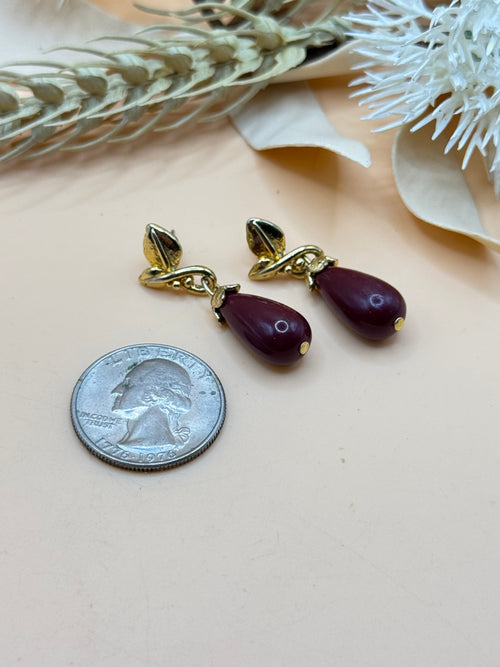 Burgundy Teardrop Dangle Earrings with Gold Tone Leaf Design