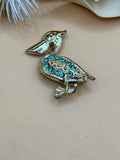 Gold Tone Pelican Bird Brooch Blue Rhinestone Figural Pin
