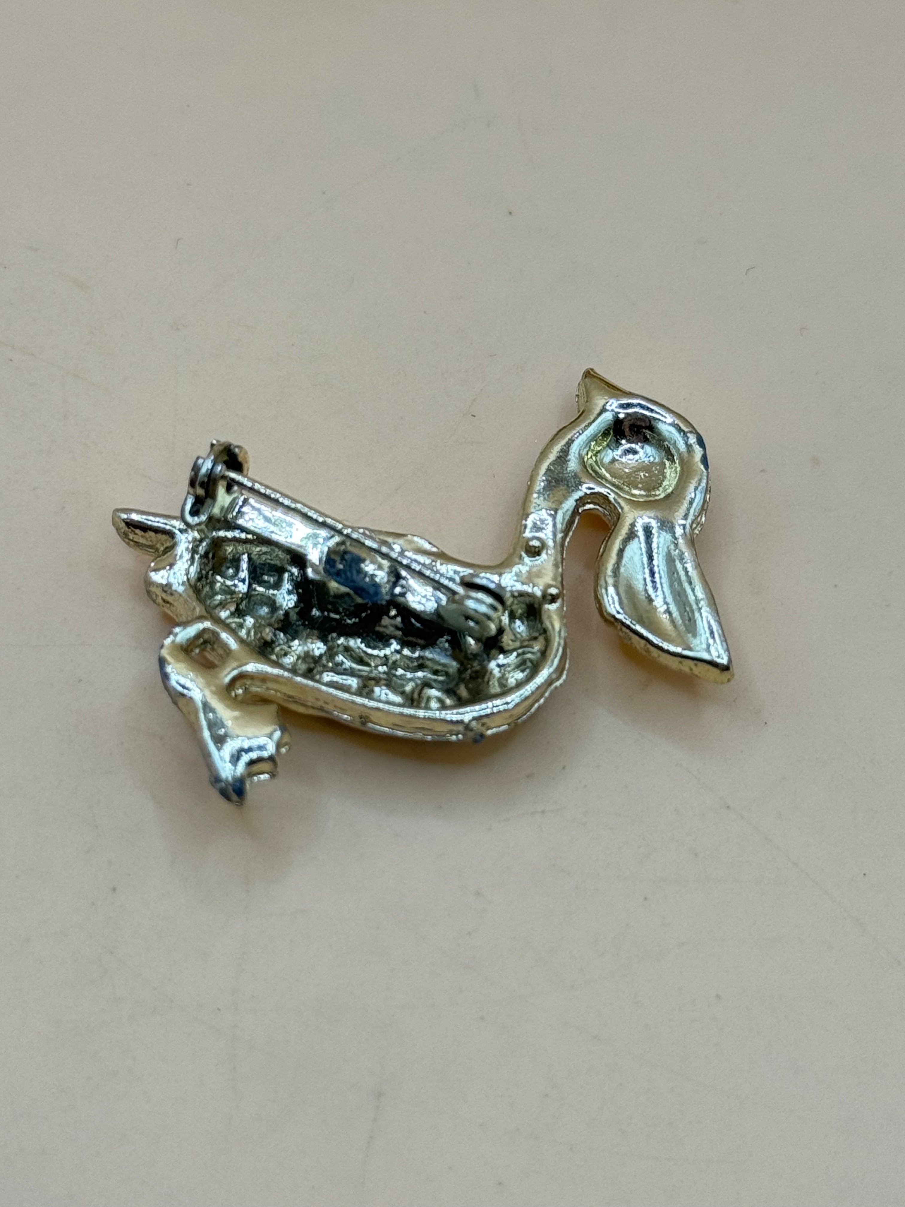 Gold Tone Pelican Bird Brooch Blue Rhinestone Figural Pin
