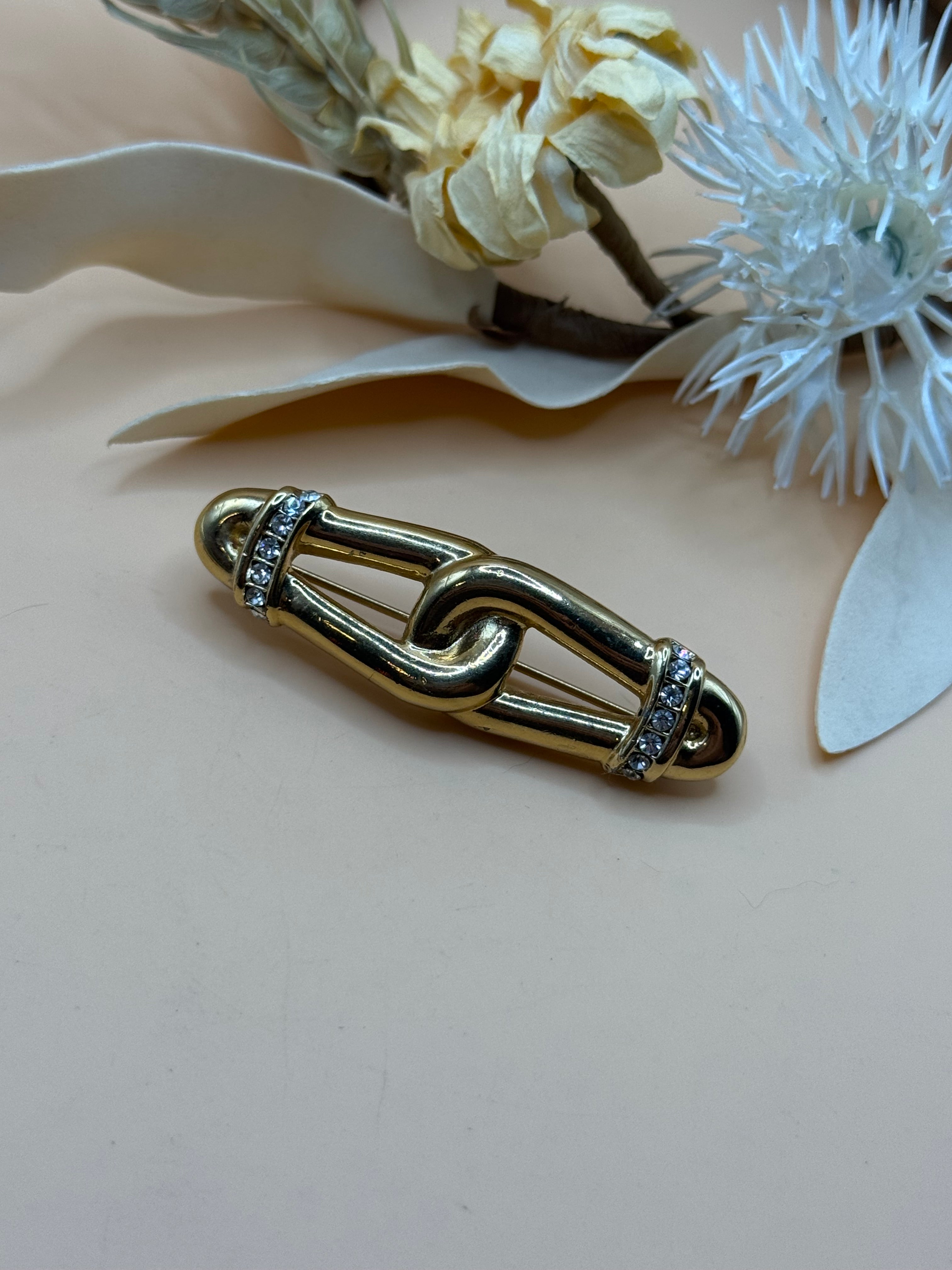 Vintage Gold Tone Modernist Swirl Bar Brooch Clear Rhinestone Accent Elegant Pin
