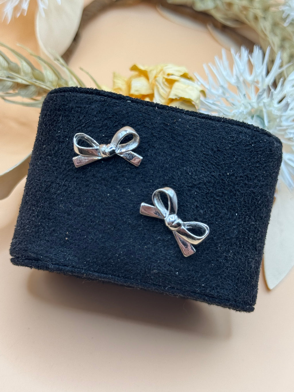 Silver Tone Bow Stud Earrings