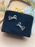 Silver Tone Bow Stud Earrings