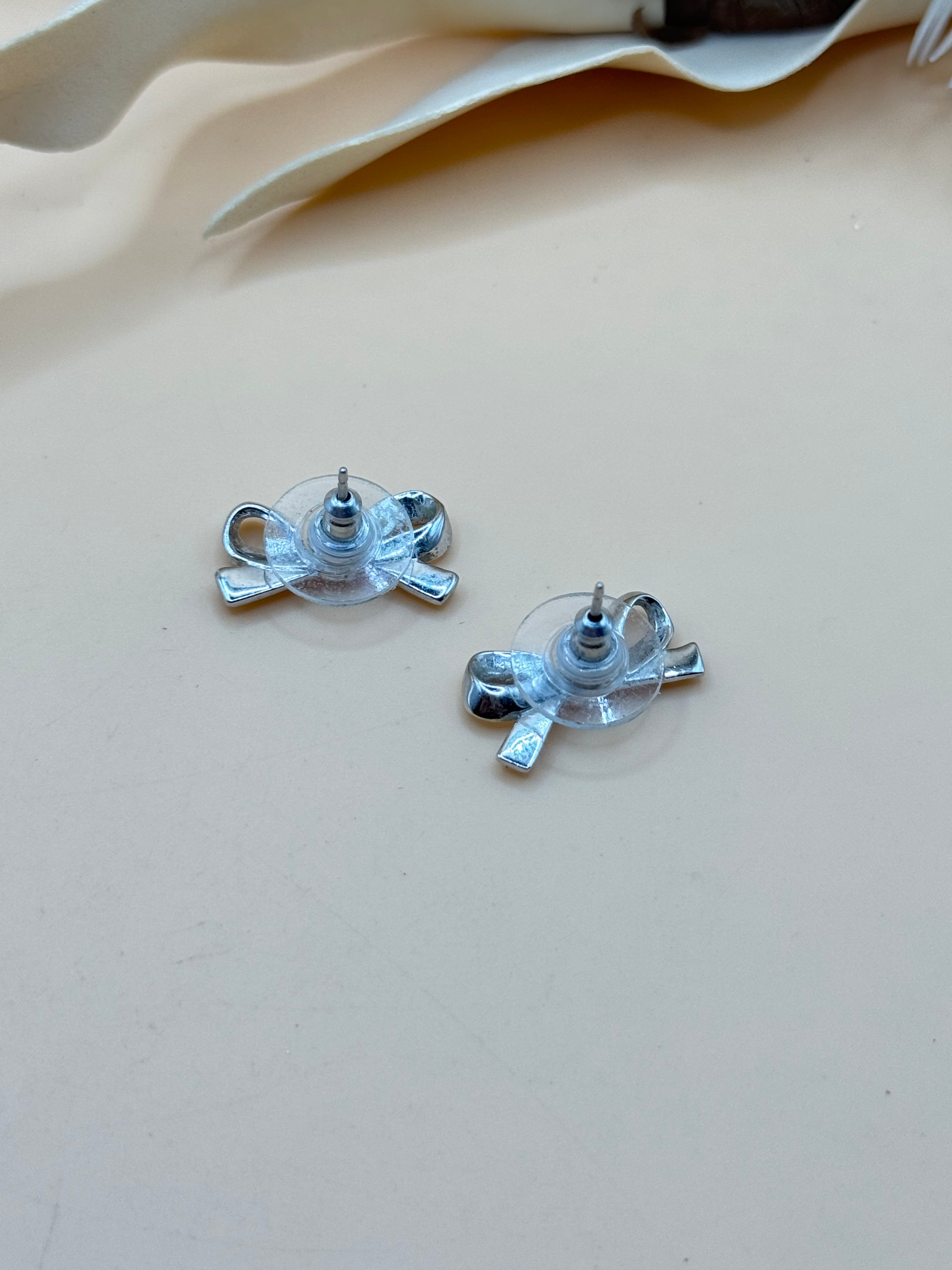 Silver Tone Bow Stud Earrings