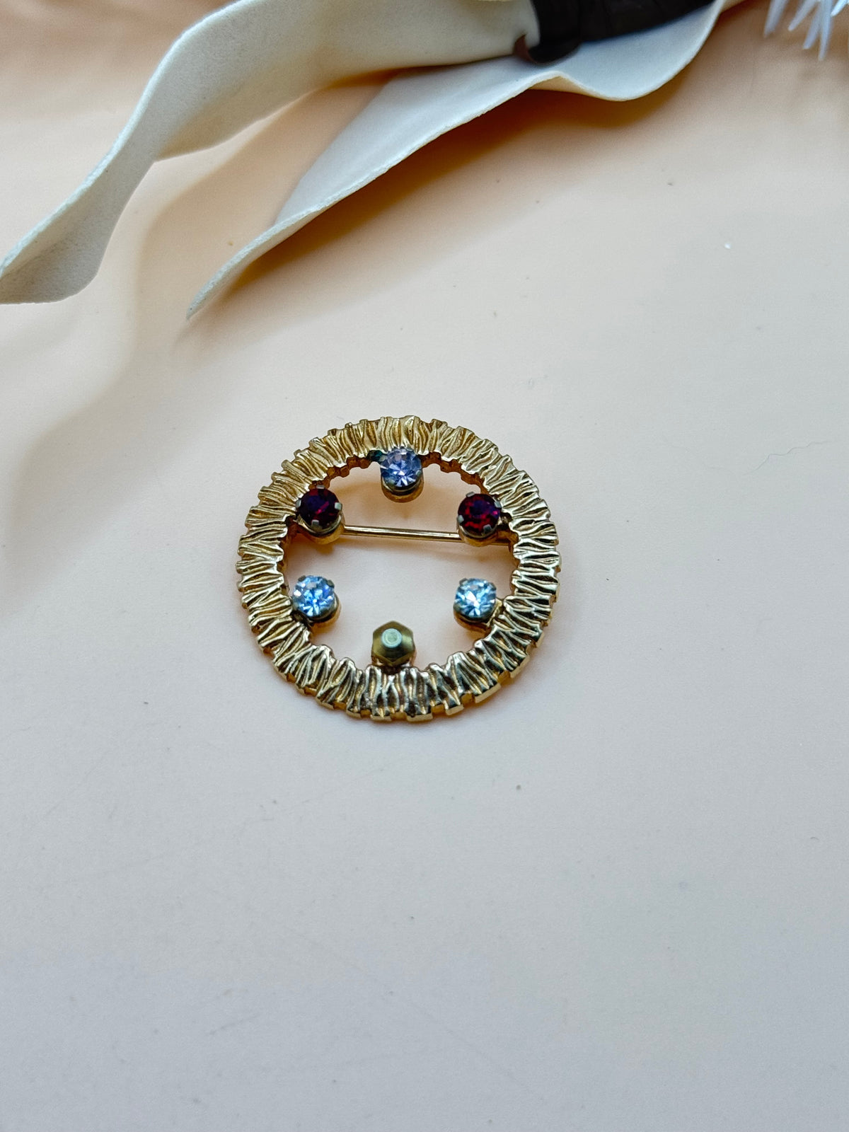 Vintage Anson Gold Tone Multicolor Rhinestone Circle Brooch