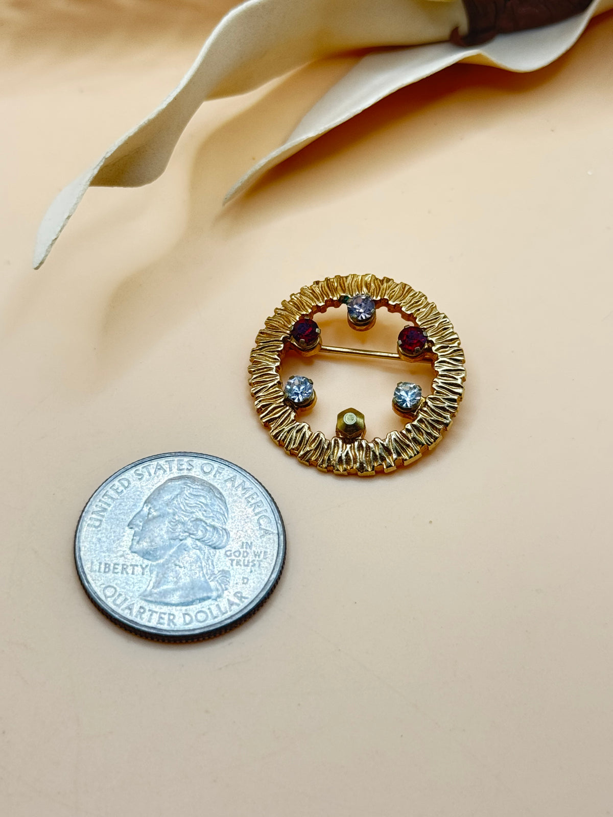 Vintage Anson Gold Tone Multicolor Rhinestone Circle Brooch