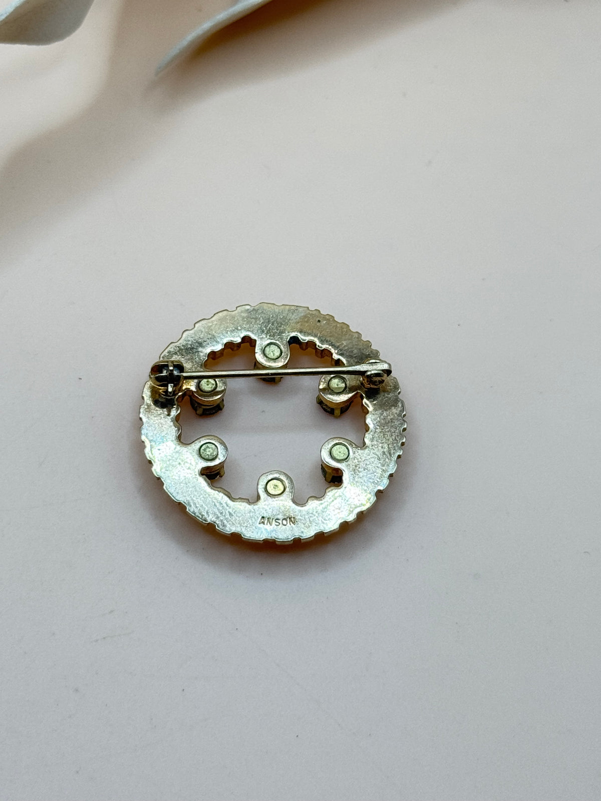 Vintage Anson Gold Tone Multicolor Rhinestone Circle Brooch